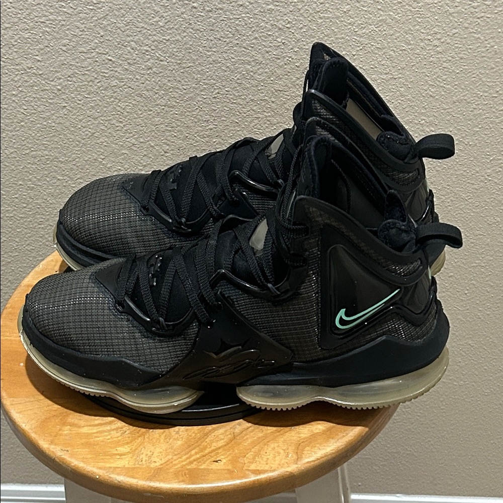 Nike Black Basketball Shoes with Teal Swoosh